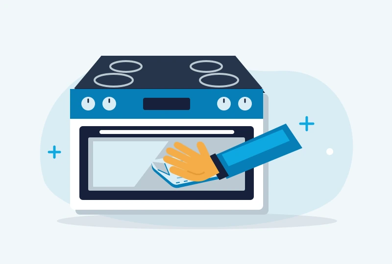 Illustration of an oven with four stovetop cooking zones and a gloved hand wiping the oven glass